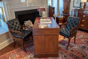 A Matched Pair Of Classical Mahogany And Leather Armchairs. Detail