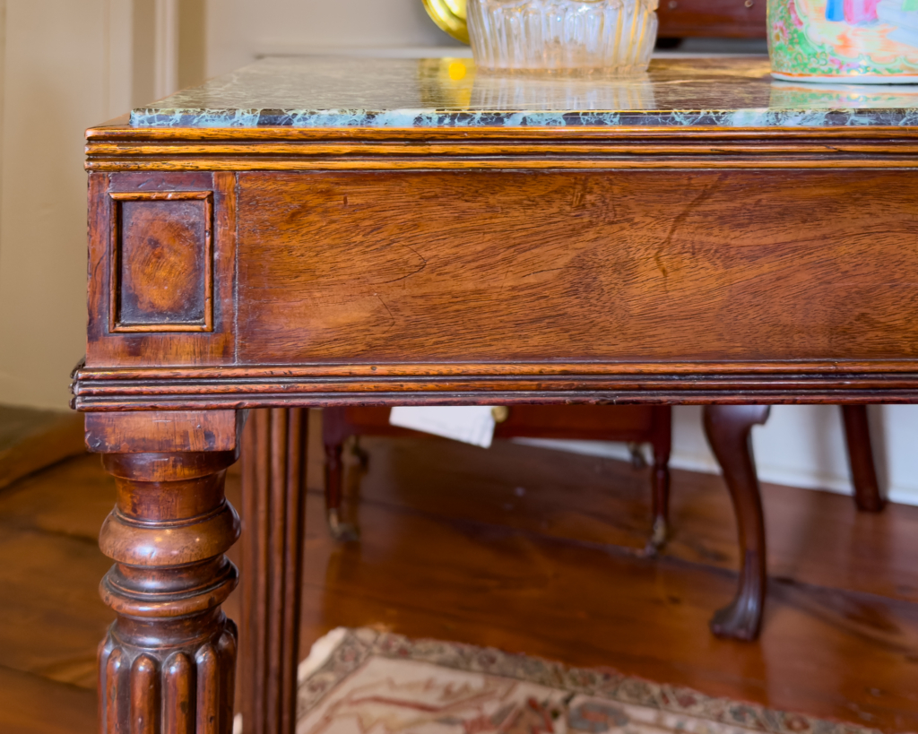 A Scarce And Elegant Sheraton Mahogany Mixing TableRetaining The Original Marble Top Above A Reeded Freize, Ending In Original Brass Caps - detail view